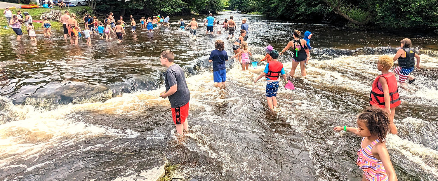 kids in the little salmon river at jellytone park in mexico ny kids in the little salmon river